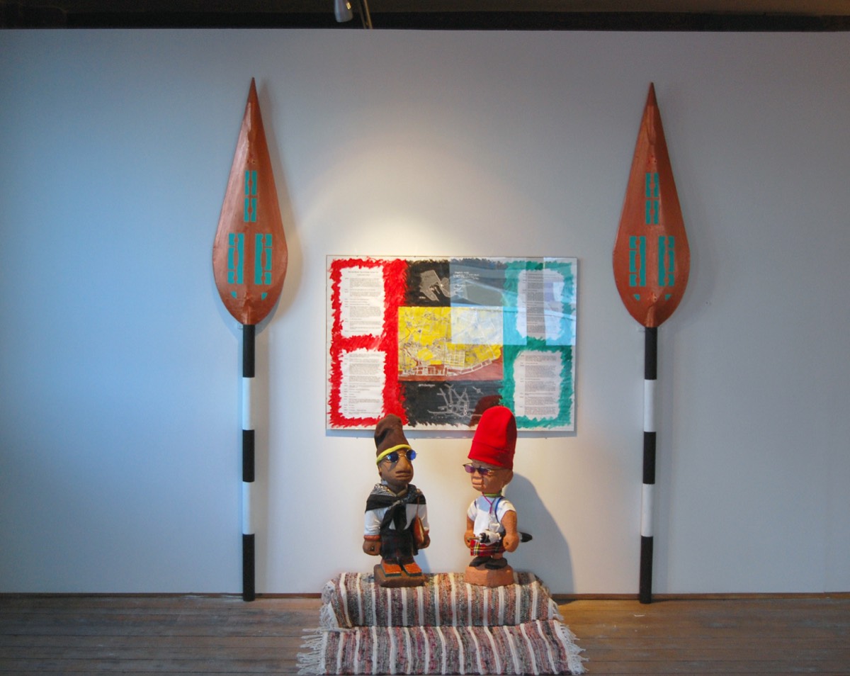 Minnie & Slim Ibeji Figures, by Paul Clarkson, 2008. Installation photograph by Kimathi Donkor